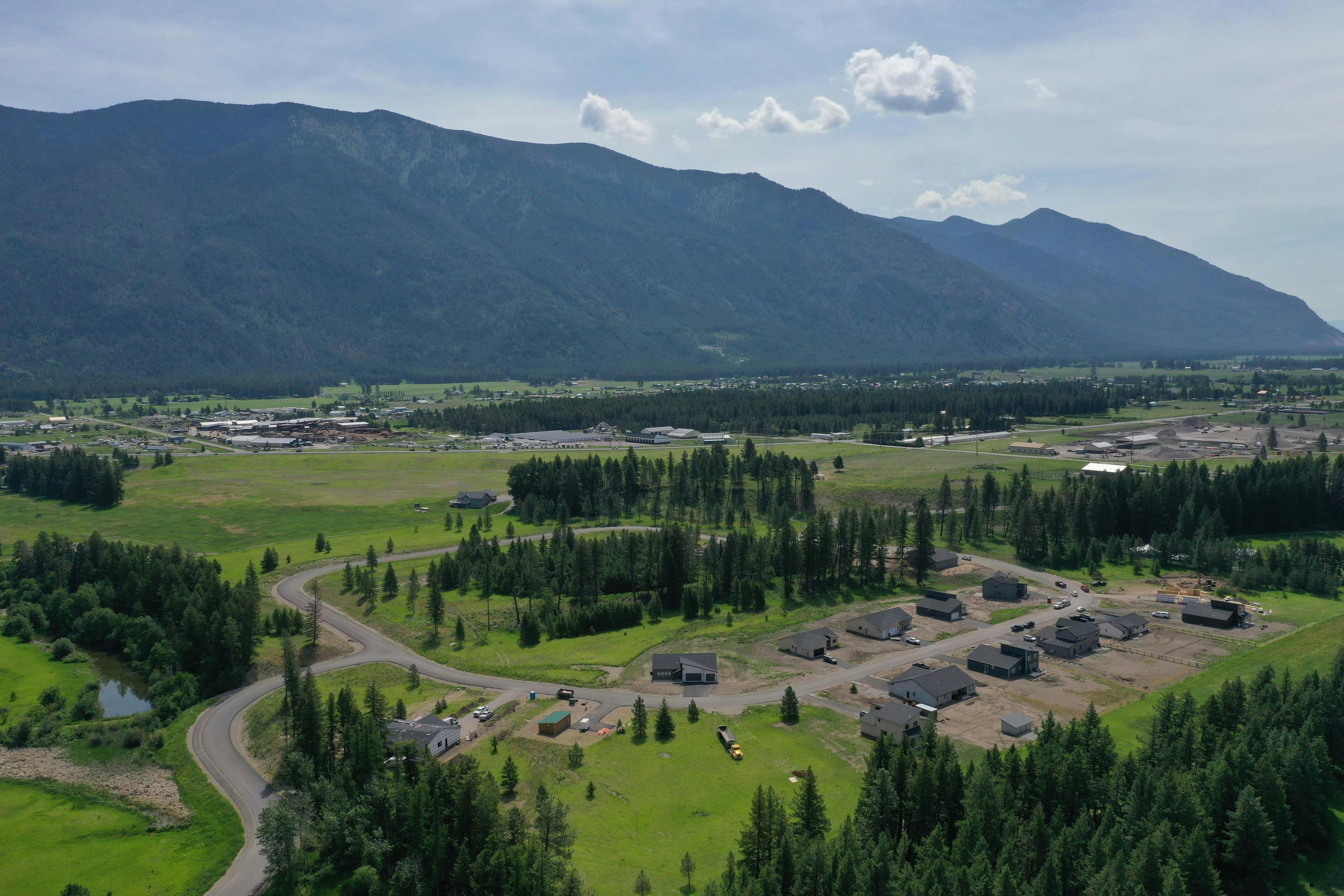 Aerial view of a Terry Homes community with mountains in background